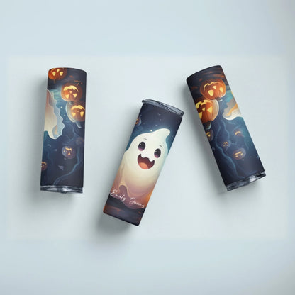 The Ghost Personalized 20oz Skinny Tumbler – Halloween Cup features glowing jack-o-lanterns, swirling dark clouds, and a smiling cartoon ghost—ideal for a festive, custom-name Halloween drinkware experience.